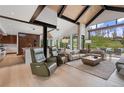 Open concept living space featuring contemporary furnishings and stunning views at 444 Glen Eagle Loop, Breckenridge, CO 80424