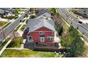 Aerial view of the rear of the home with a large deck, bay window, and manicured lawn at 11703 S Rock Willow Way, Parker, CO 80134