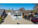 Aerial view of a charming home with well-maintained yard and surrounding neighborhood at 3929 Federal Blvd, Denver, CO 80211