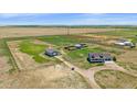 Expansive property featuring a charming home, a large workshop, and vast open spaces at 32800 E 137Th Way, Brighton, CO 80603