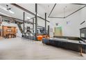 Open floorplan features a breakfast bar and living room with lots of natural light at 2801 Lawrence St, Denver, CO 80205