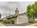 Exterior view of a home showcasing its well-maintained siding and landscaping at 10295 E Evans Ave # 114, Aurora, CO 80247