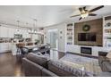 Open concept living space featuring stylish decor and seamless flow to the kitchen at 6834 Clay N St, Denver, CO 80221