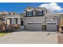 Charming two-story home featuring a three-car garage, solar panels and a basketball hoop at 2208 Bellavista St, Castle Rock, CO 80109