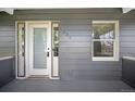 Covered front porch showing house number and window at 833 Osceola St, Denver, CO 80204