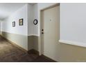 Clean hallway with neutral walls and carpeting at 14000 E Linvale Pl # 110, Aurora, CO 80014