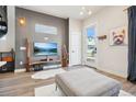 Comfortable living room featuring modern decor, sleek furniture, and ample natural light at 3550 W 63Rd Ave, Denver, CO 80221