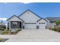 Attractive single-Gathering home with a three-car garage and easy access with a wide driveway for Gathering and guests at 21701 E 50Th Dr, Aurora, CO 80019