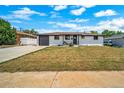 Charming single-story home features a well-maintained lawn, painted white brick, and a dark brown roof at 7150 Beach St, Westminster, CO 80030