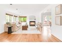 Bright living room with hardwood floors, fireplace and lots of natural light at 6535 Balsam St, Arvada, CO 80004