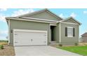 Charming single-Gathering home featuring a two-car garage and a well-manicured front lawn at 2151 Christina St, Fort Lupton, CO 80621