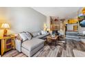 Cozy living room with sectional, decorative rug and view of the kitchen at 434 Kings Crown Rd, Breckenridge, CO 80424