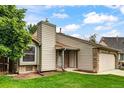 Charming single-Gathering home with siding and stone accents, featuring a well-kept lawn at 5101 E 122Nd Cir, Thornton, CO 80241