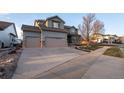 Charming two-story home with stone accents and a three-car garage at 3685 Roberts St, Mead, CO 80542