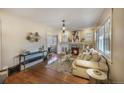 Inviting living room with fireplace and hardwood floors at 460 S Sherman St, Denver, CO 80209