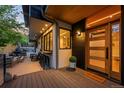 Inviting outdoor patio features a built-in bar, cozy seating, and stylish wood accents at 2725 6Th St, Boulder, CO 80304