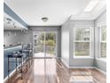 Open kitchen area with bar seating and natural light at 6861 Xavier Cir # 3, Westminster, CO 80030