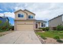 Charming two-story home with a two car garage and manicured lawn in a residential neighborhood at 4915 Parsons Way, Castle Rock, CO 80104
