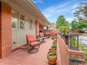 Inviting outdoor patio with comfortable seating, colorful potted plants, and a relaxed ambiance at 3481 S Race St, Englewood, CO 80113