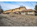 A view of the townhouses in the neighborhood on a crisp morning at 1191 S Troy St, Aurora, CO 80012