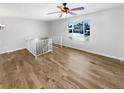 Bright living room with hardwood floors and a view to the exterior at 928 S Ventura St, Aurora, CO 80017