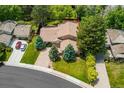 An aerial shot showcasing the home's setting and surrounding neighborhood at 6407 S Heritage W Pl, Centennial, CO 80111