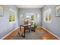 Bright home office with hardwood floors, neutral paint and natural light throughout at 913 Alkire Ct, Golden, CO 80401