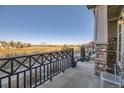 Relaxing back porch with scenic golf course views; an ideal outdoor living space at 3751 W 136Th Ave # P3, Broomfield, CO 80023
