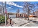 Inviting single Gathering home with a large driveway and two car garage at 2675 S Carson Way, Aurora, CO 80014