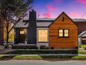 Charming home features black brick, wood siding, black trim and modern design at 1640 E Virginia Ave, Denver, CO 80209