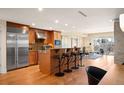Modern kitchen with stainless steel appliances, a breakfast bar, and an open layout perfect for entertaining at 1411 Wynkoop St # 804, Denver, CO 80202