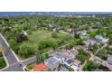 Breathtaking aerial view of a neighborhood park and lush green landscape in a desirable residential neighborhood at 220 Glencoe St, Denver, CO 80220