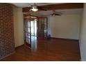 Bright living room featuring hardwood floors and glass panel doors at 6775 S Sherman St, Centennial, CO 80122