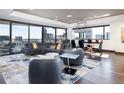 Spacious living area with modern furnishings, expansive windows, and an open layout at 1133 14Th St # 3320, Denver, CO 80202