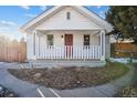 House exterior featuring a white front porch at 1305 Tamarac St, Denver, CO 80220