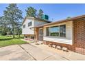 Charming exterior showcasing a well-maintained yard and updated architecture at 15065 Huron St, Broomfield, CO 80023