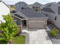Inviting single-Gathering home with a two-car garage, manicured lawn, and charming neighborhood setting at 21893 E Tufts Cir, Aurora, CO 80015