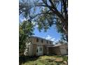 Charming two-story home featuring neutral siding, an attached two car garage, and a well-maintained lawn at 10611 Holland St, Broomfield, CO 80021