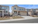 Inviting two-story home with a well-kept lawn and neutral-toned siding at 2464 Garganey Dr, Castle Rock, CO 80104