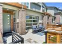Inviting outdoor patio with comfortable seating and stylish decor at 4021 S Teller St, Lakewood, CO 80235
