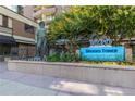 Exterior view of Brooks Tower signage, landscaping and sculpture at 1020 15Th St # 15K, Denver, CO 80202