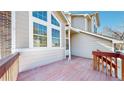 Inviting front porch with painted wood deck offering a cozy entrance to this home at 5421 E Prescott Ave, Castle Rock, CO 80104