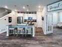 Modern kitchen with stainless steel appliances and an island at 3074 Distant Rock Ave, Castle Rock, CO 80109