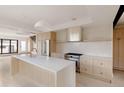 Spacious kitchen with stainless appliances, a center island, and modern cabinetry for a sleek design at 4322 Quivas St, Denver, CO 80211