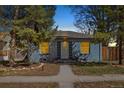 Charming home with mature trees and inviting curb appeal at 2570 Jay St, Edgewater, CO 80214