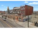 Exterior view of building showing architecture, connected walkways, balconies and surroundings at 2715 Blake St # 304, Denver, CO 80205