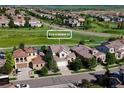 Charming two-story home with a well-manicured lawn in a desirable neighborhood at 2276 S Norse St, Lakewood, CO 80228