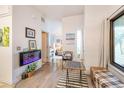 Inviting living room with wood floors, natural light, and stylish décor at 919 S Dawson Way # 17, Aurora, CO 80012