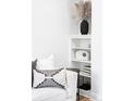 Cozy living room corner featuring stylish decor, bookshelf, and comfortable seating perfect for relaxing and reading at 2313 S Race St # A, Denver, CO 80210
