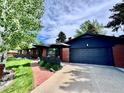 Stylish brick home with a spacious driveway and a well-maintained lawn at 2774 S Milwaukee St, Denver, CO 80210